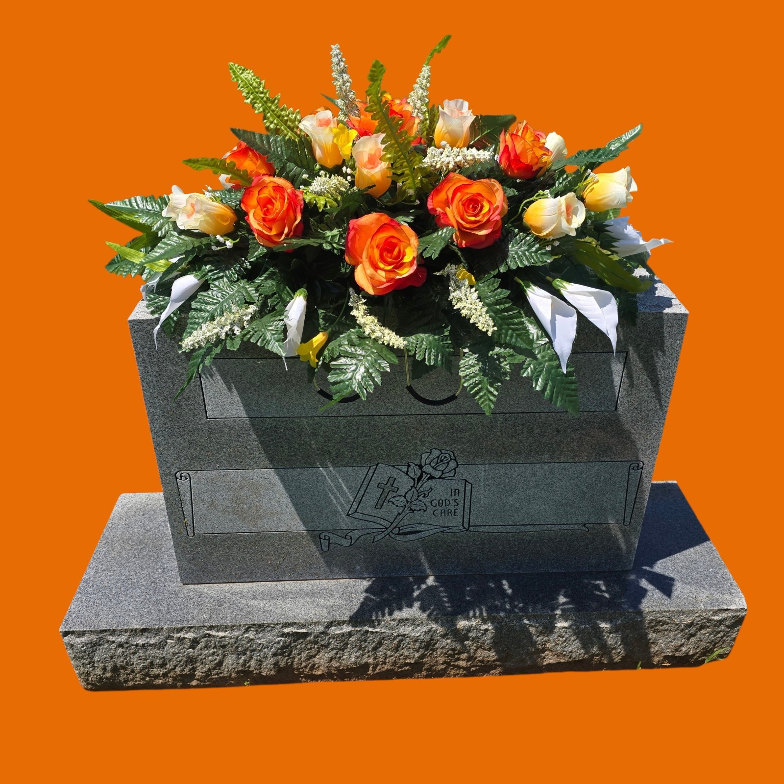 ORANGE AND WHITE HEADSTONE SADDLE WITH ORANGE ROSES & CALLA LILY’S FOR CEMETERY