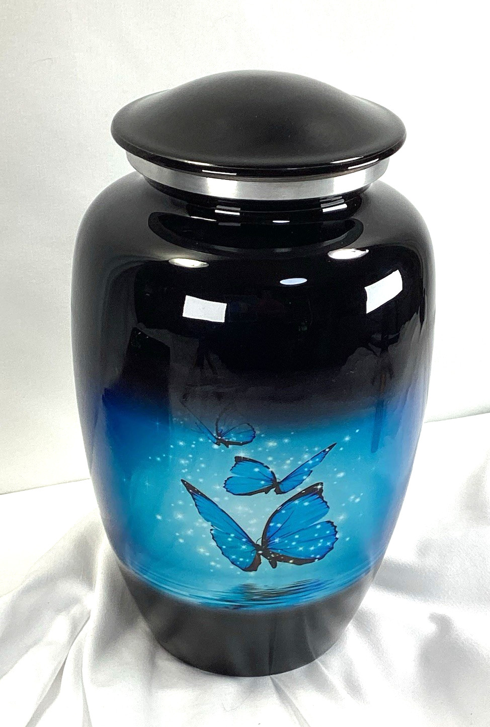Blue Butterfly Urn, capacity for 200 lbs adult. Roller marks on glaze, see Pics
