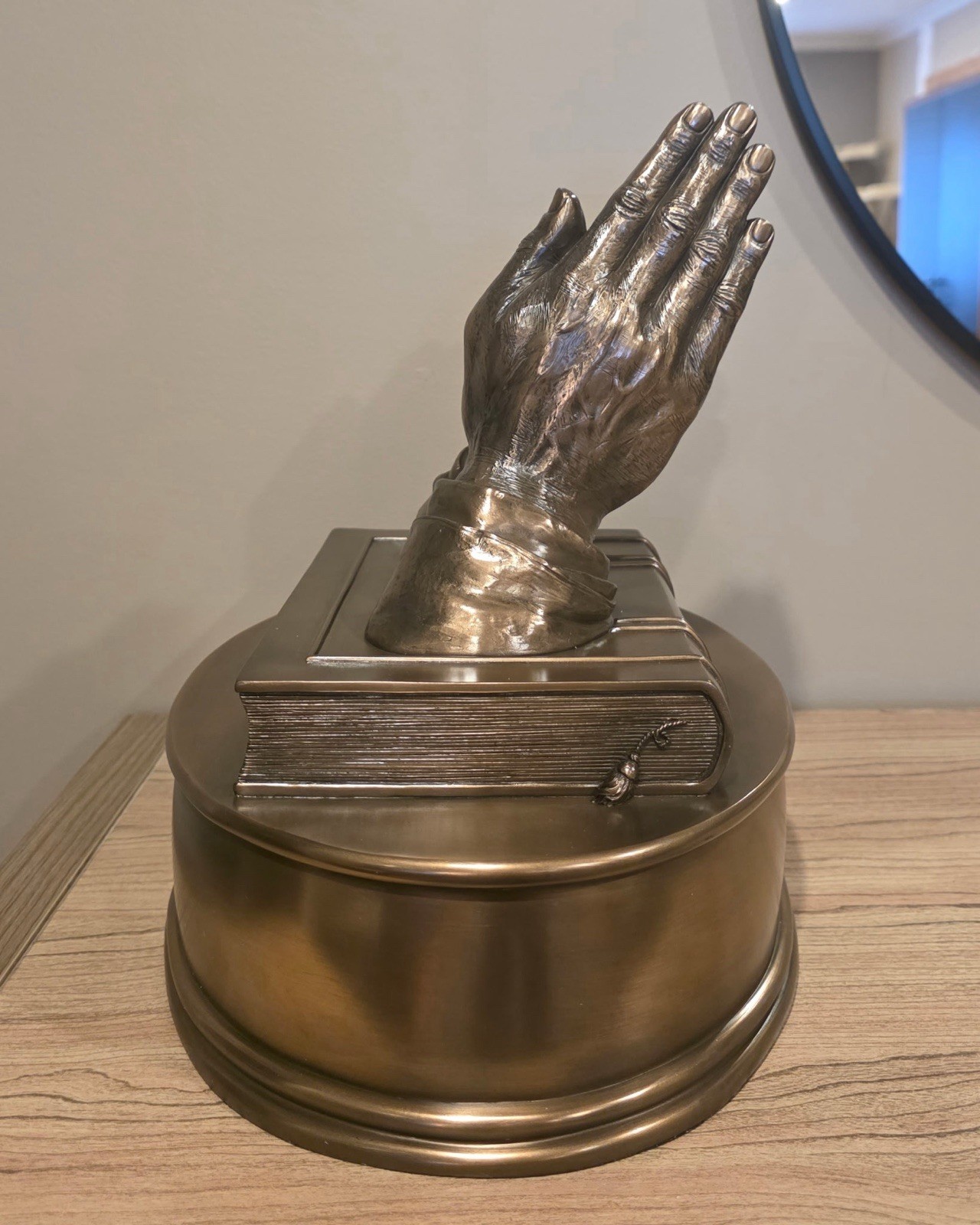 Metal Cremation Urn with Praying Hands and Book Sculpture Religious Motif
