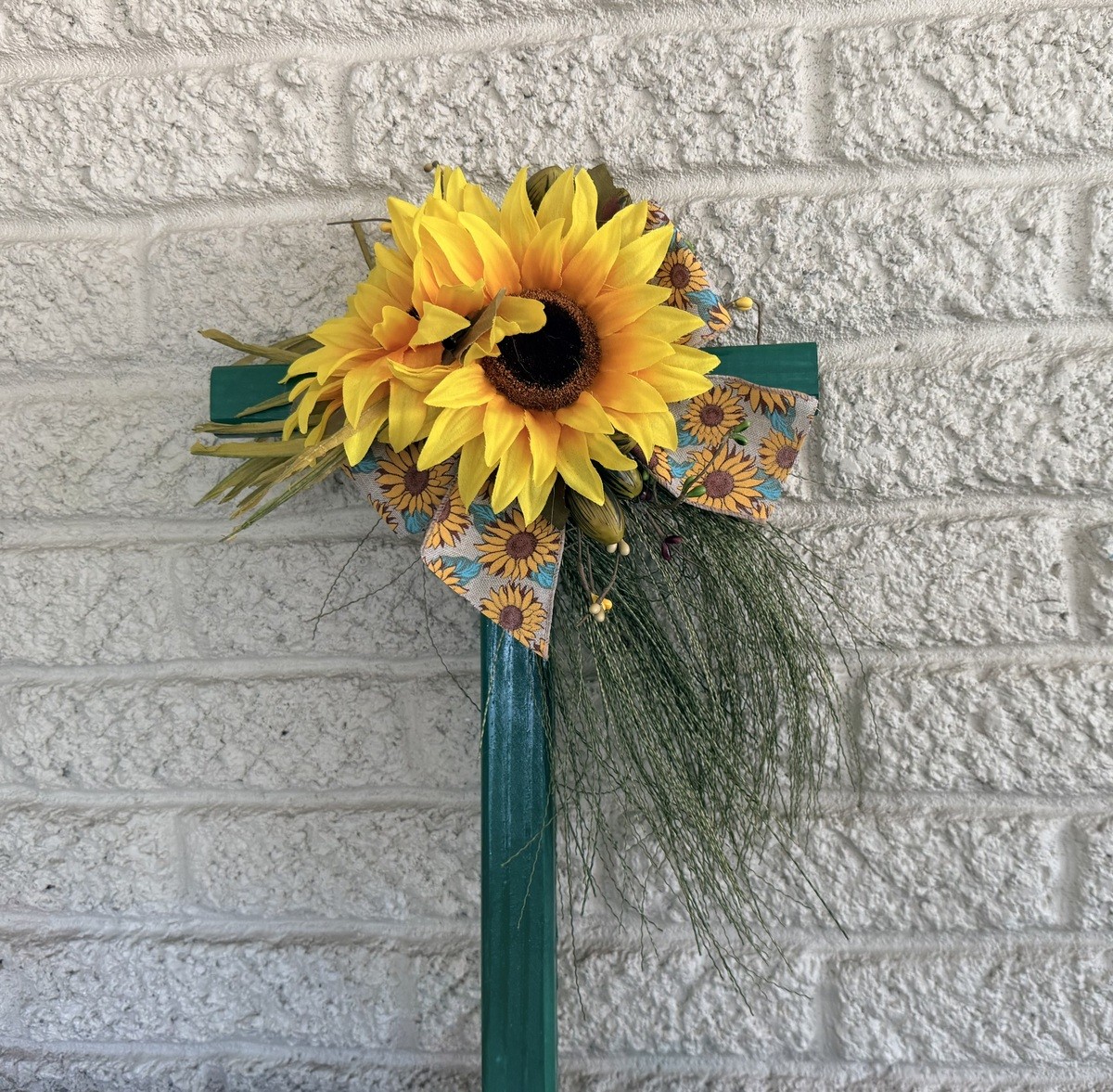 Cemetery flowers, cemetery decoration, lillies memorial flowers, cross memorial