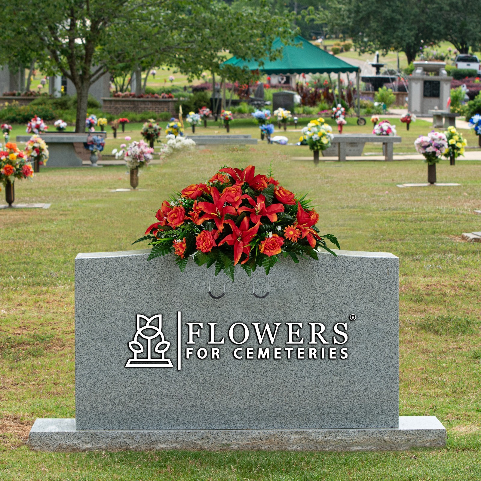 Artificial Headstone Arrangement- Fire Red Lily, Rose, and Daisies Saddle