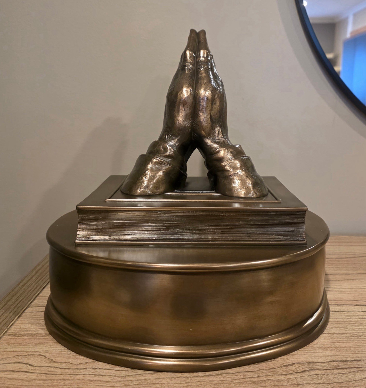 Metal Cremation Urn with Praying Hands and Book Sculpture Religious Motif