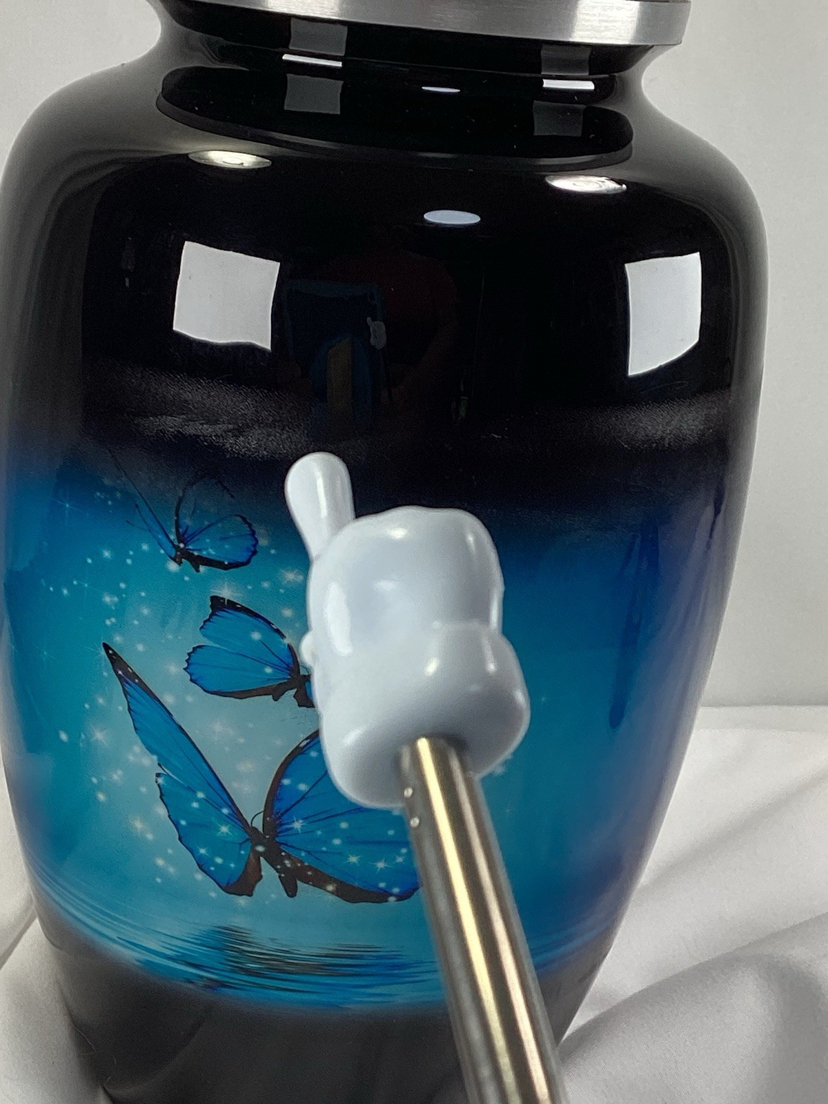 Blue Butterfly Urn, capacity for 200 lbs adult. Roller marks on glaze, see Pics