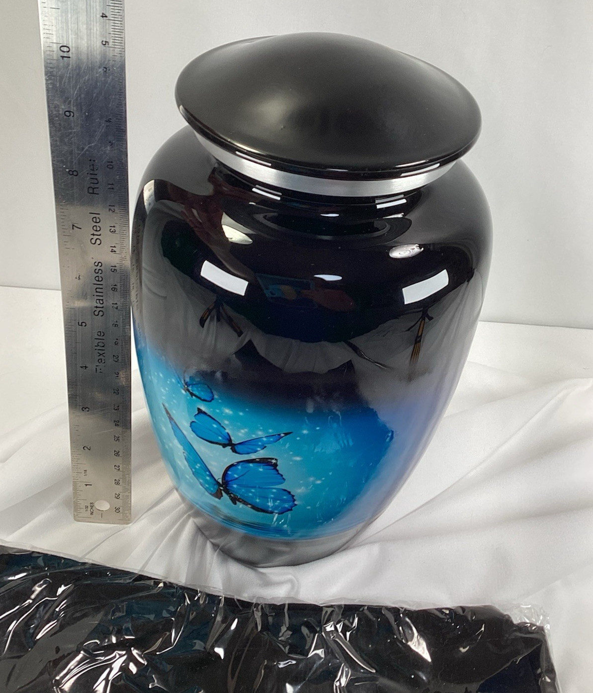 Blue Butterfly Urn, capacity for 200 lbs adult. Roller marks on glaze, see Pics