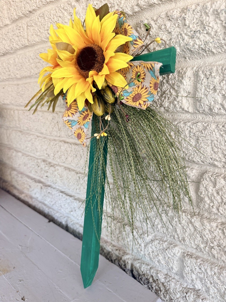 Cemetery flowers, cemetery decoration, lillies memorial flowers, cross memorial