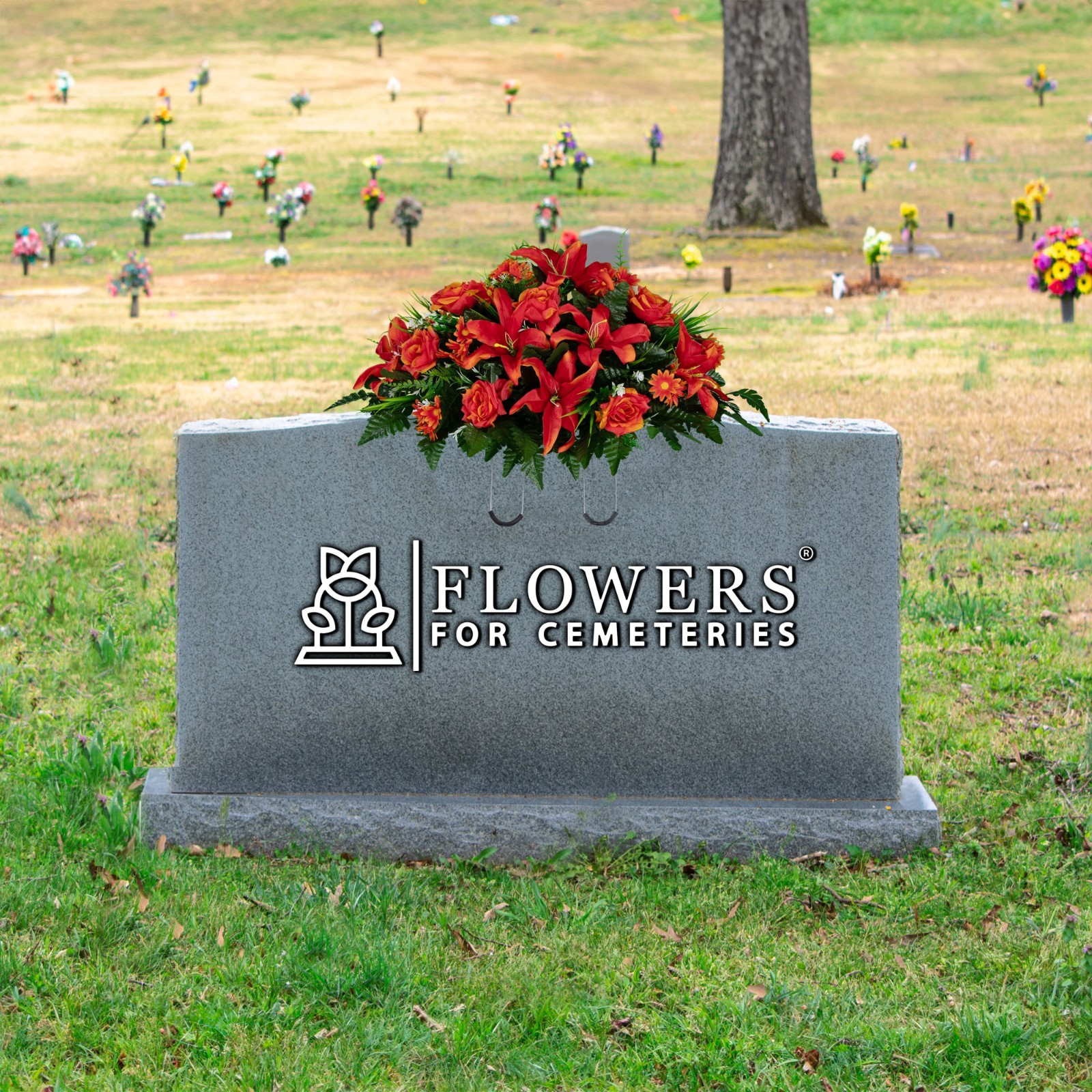 Artificial Headstone Arrangement- Fire Red Lily, Rose, and Daisies Saddle