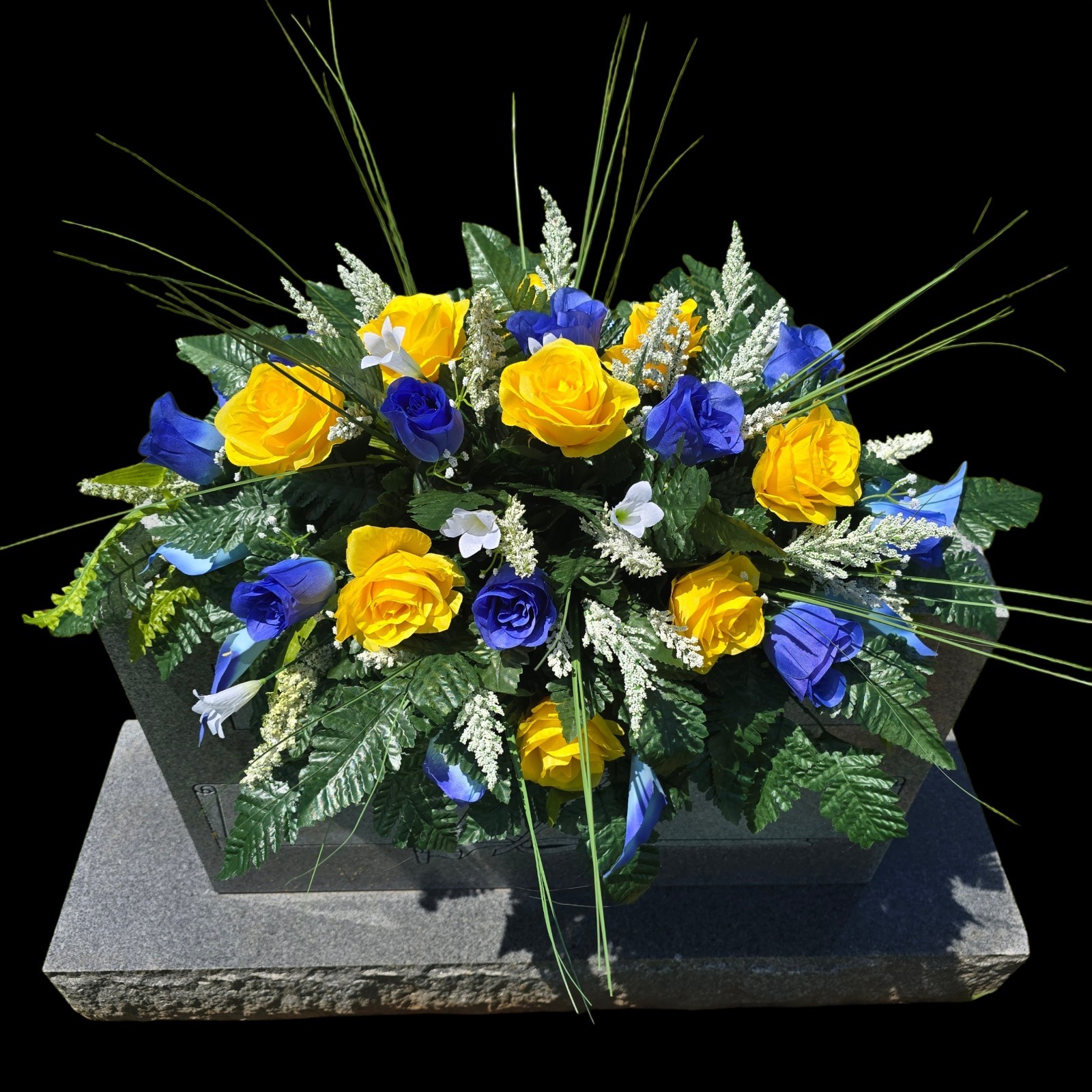BLUE AND YELLOW HEADSTONE SADDLE WITH YELLOW ROSES & BLUE LILY’S FOR CEMETERY