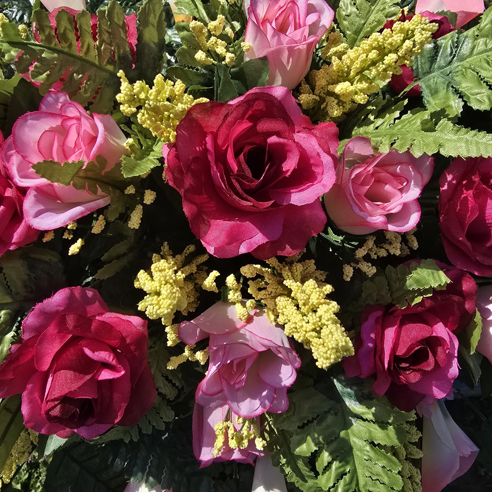 BEAUTY PINK HEADSTONE SADDLE WITH BEAUTY ROSES AND CALLA LILY’S FOR CEMETERY