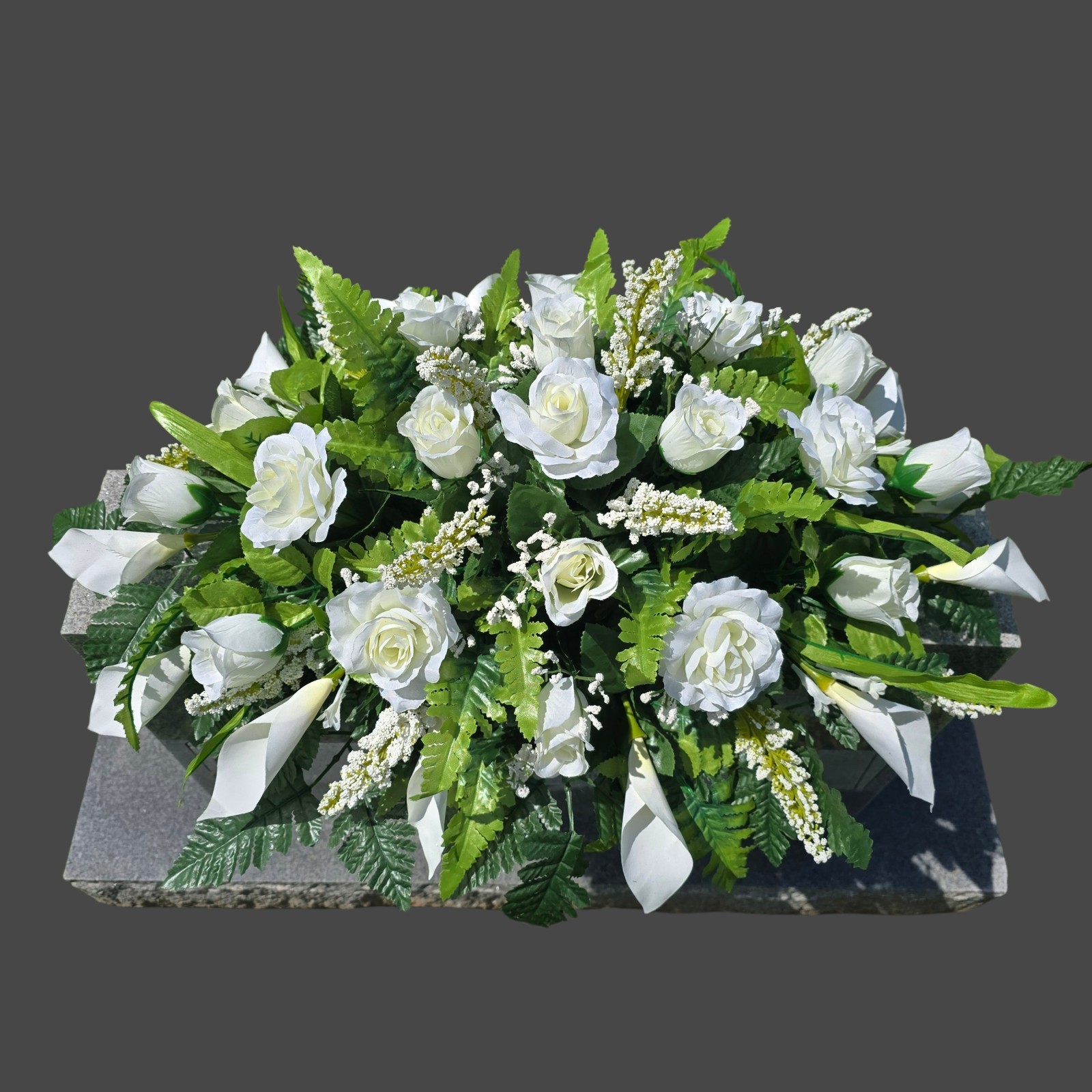 CREAM WHITE HEADSTONE SADDLE WITH CREAM ROSES & CALLA LILY’S FOR CEMETERY